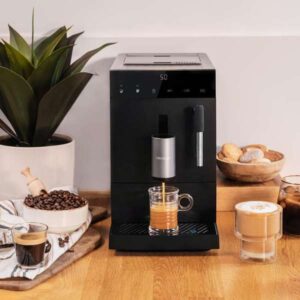 Cremmaet Compact Steam fully automatic coffee machine with 19 bar pressure, Thermoblock heating system, 5 level built-in grinder, milk steaming wand, touch screen, 1.1 liter water tank and compact design.